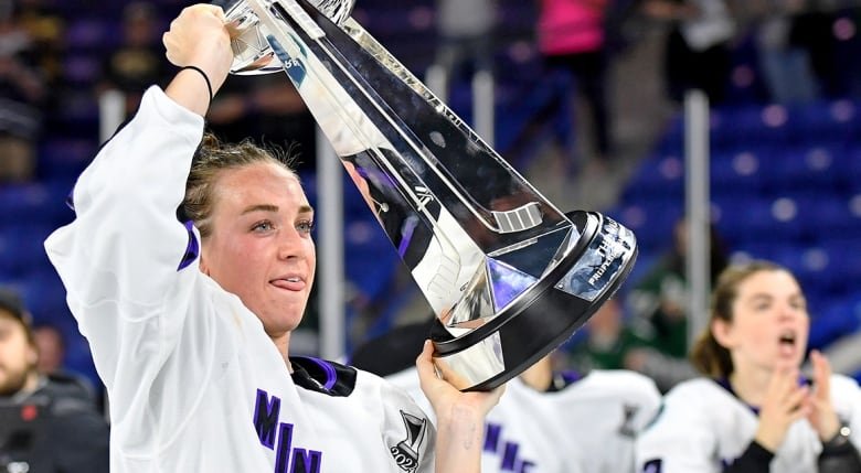 Minnesota Frost forward Taylor Heise celebrates with the Walter Cup after defeating Boston in Game 5 of the PWHL Finals at Tsongas Center in Lowell, Massachusetts on May 29, 2024.