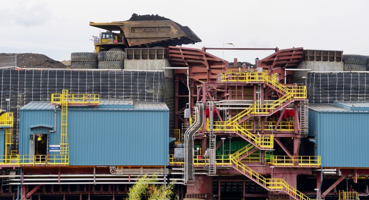 Equipment and buildings at an oilsands mine