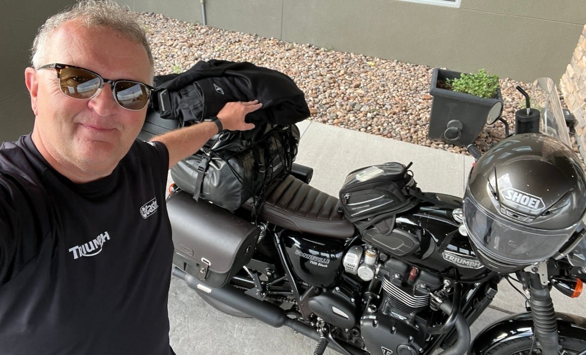 dan-davis-american-tourists-motorcycle Dan Davis with his motorcycle