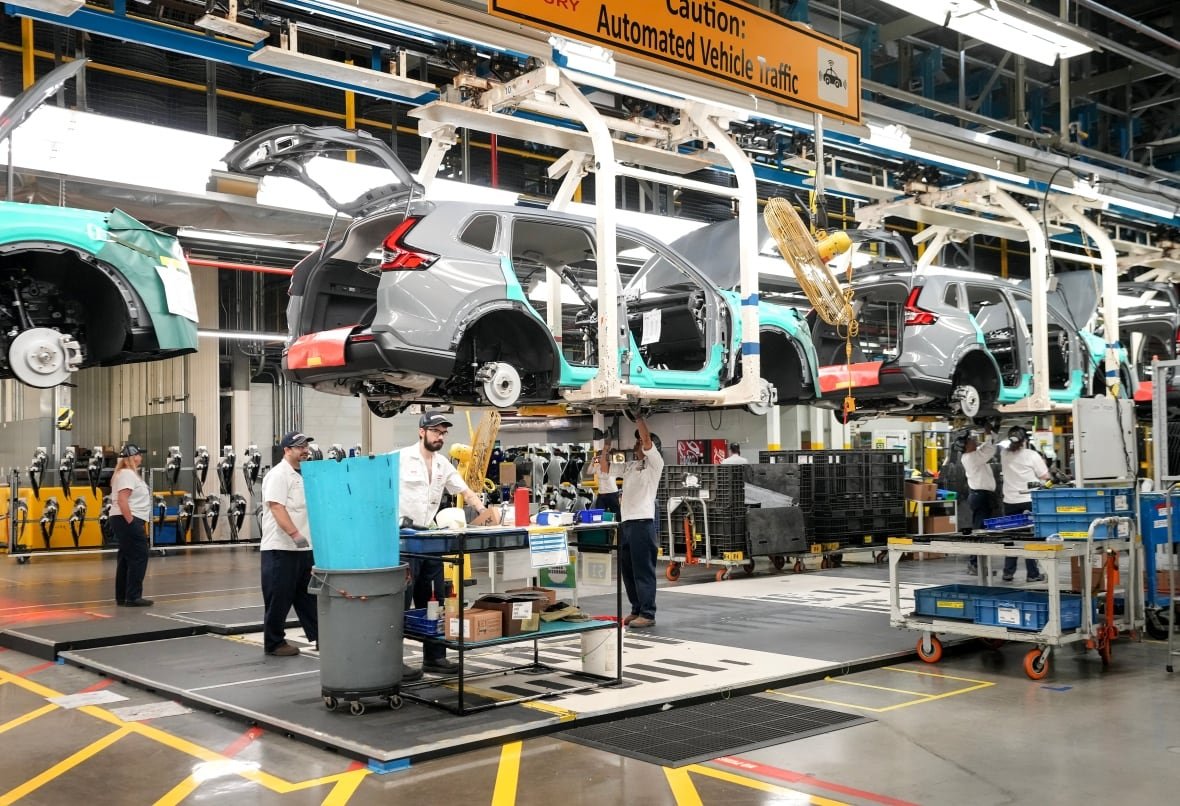 honda-alliston-plant Honda employees work along the vehicle assembly line in Alliston, Ont.