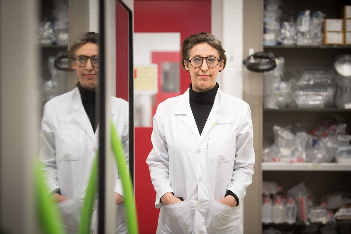 dr-samira-mubareka Sr. Mubareka, pictured in a lab, wearing a white lab coat