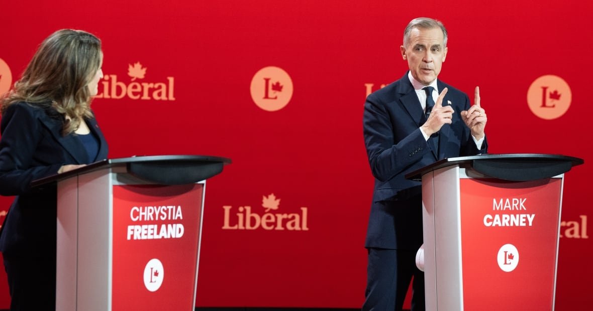 liberal-leadership-debate-20250225 Two people on a debate stage.