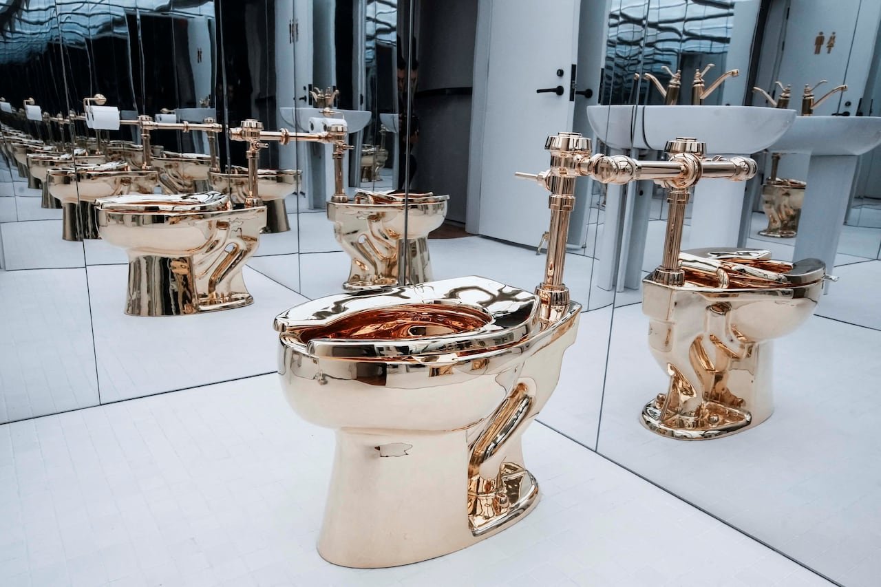 A functional solid gold toilet, a piece of art