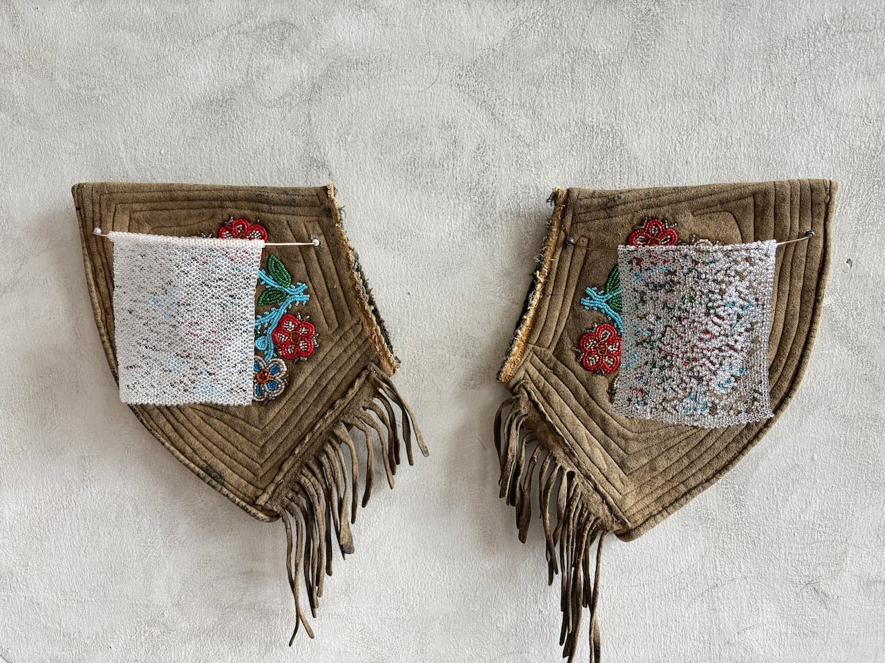 default-555 Two beaded leatherworks.