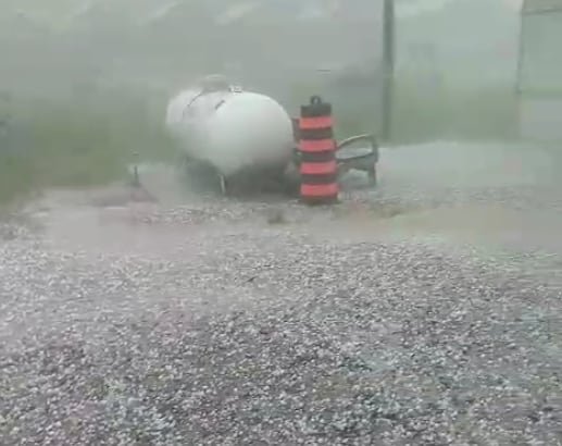 Hail on the ground at a farm