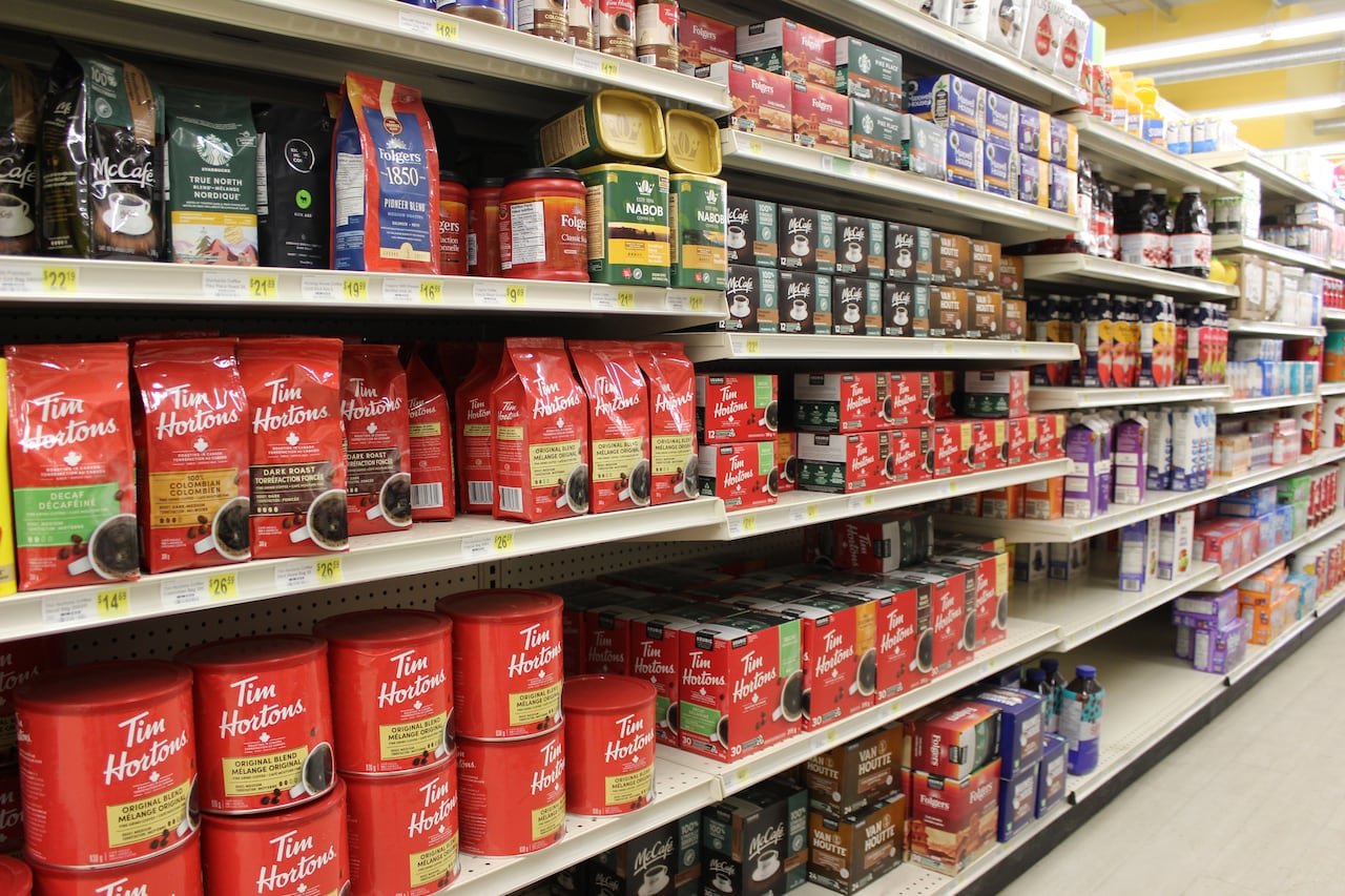 default-103 Shelves of coffee for sale in a grocery store