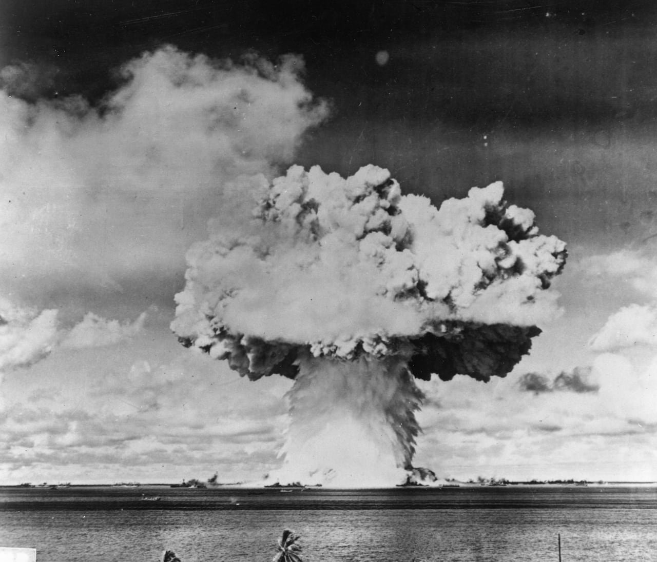 default-585 A black and white photo of a mushroom cloud over the ocean