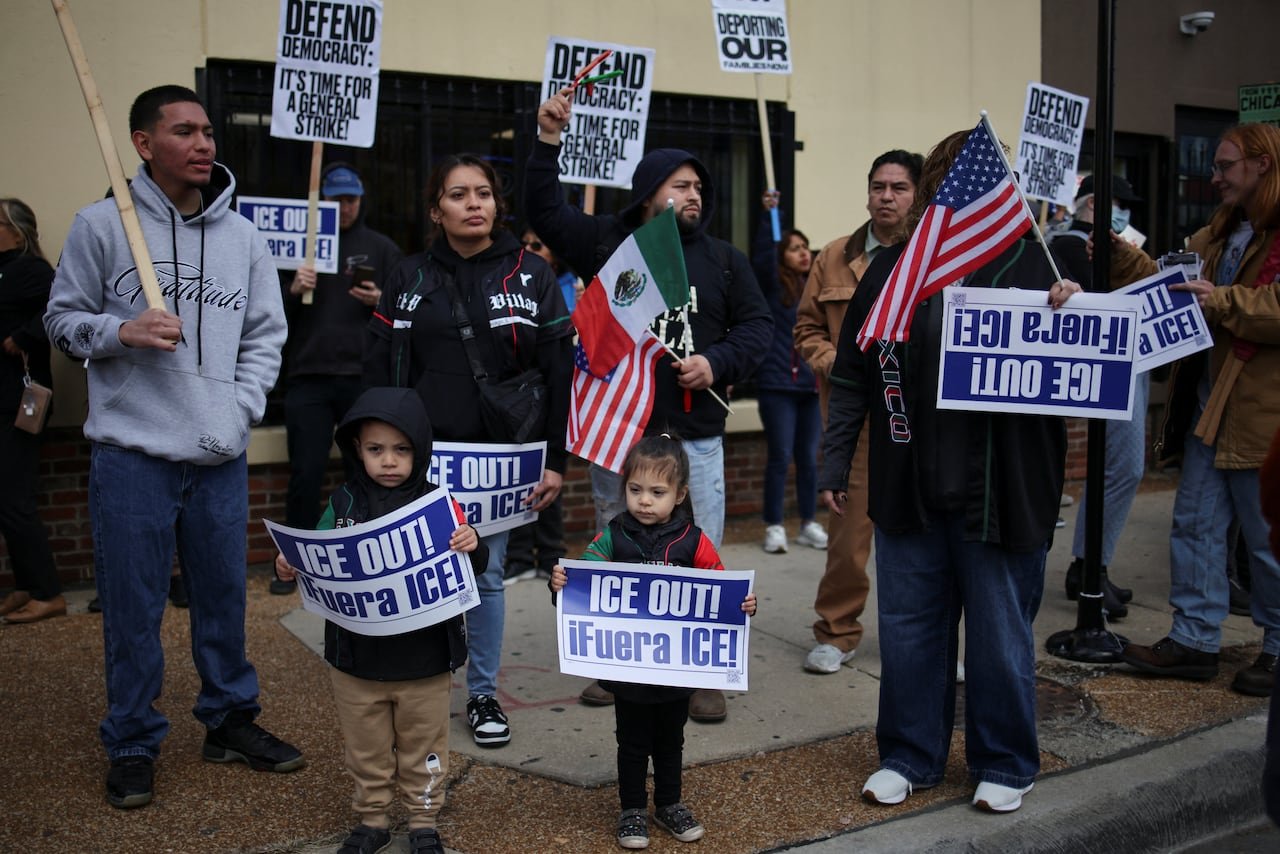 default-72 Protesters in Chicago's Little Village, holding signs that read 'Ice Out!'